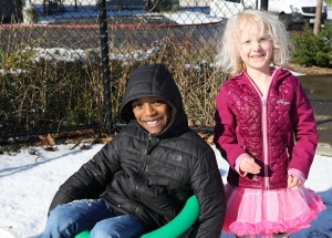 School age children at Rainier Beach on a snowy day